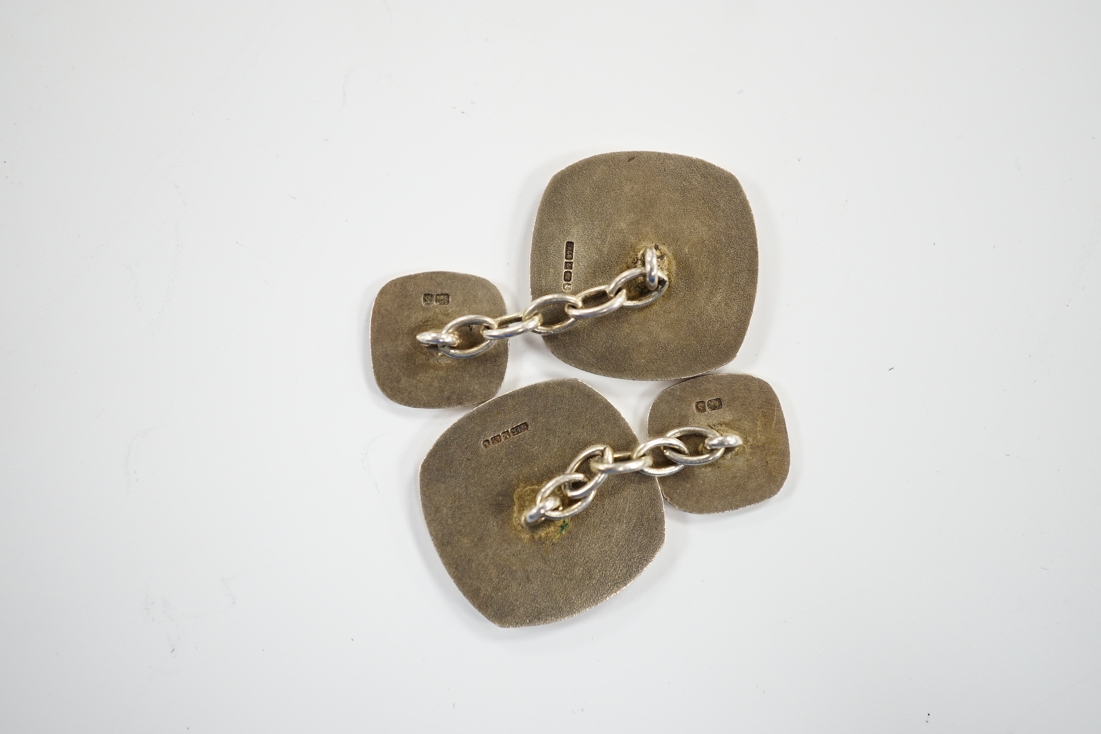 A modern pair of silver and red enamel cufflinks, embossed with the Order of The British Empire, by Toye, Kenning & Spencer, 19mm.